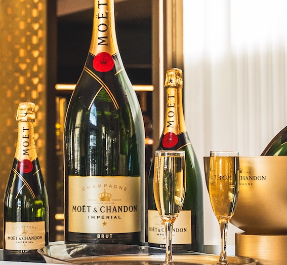 a group of bottles of champagne